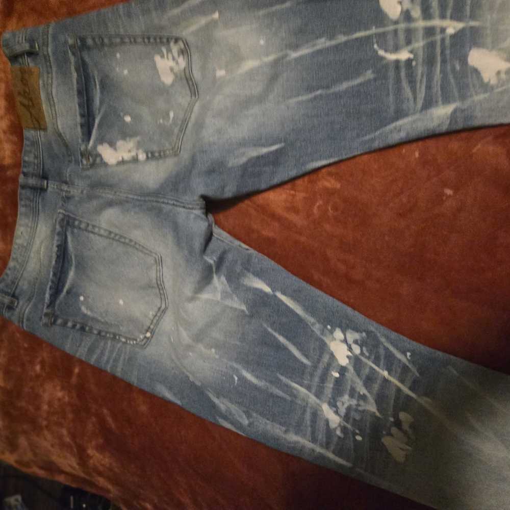 Blue Distressed Jeans with Paint Splatter